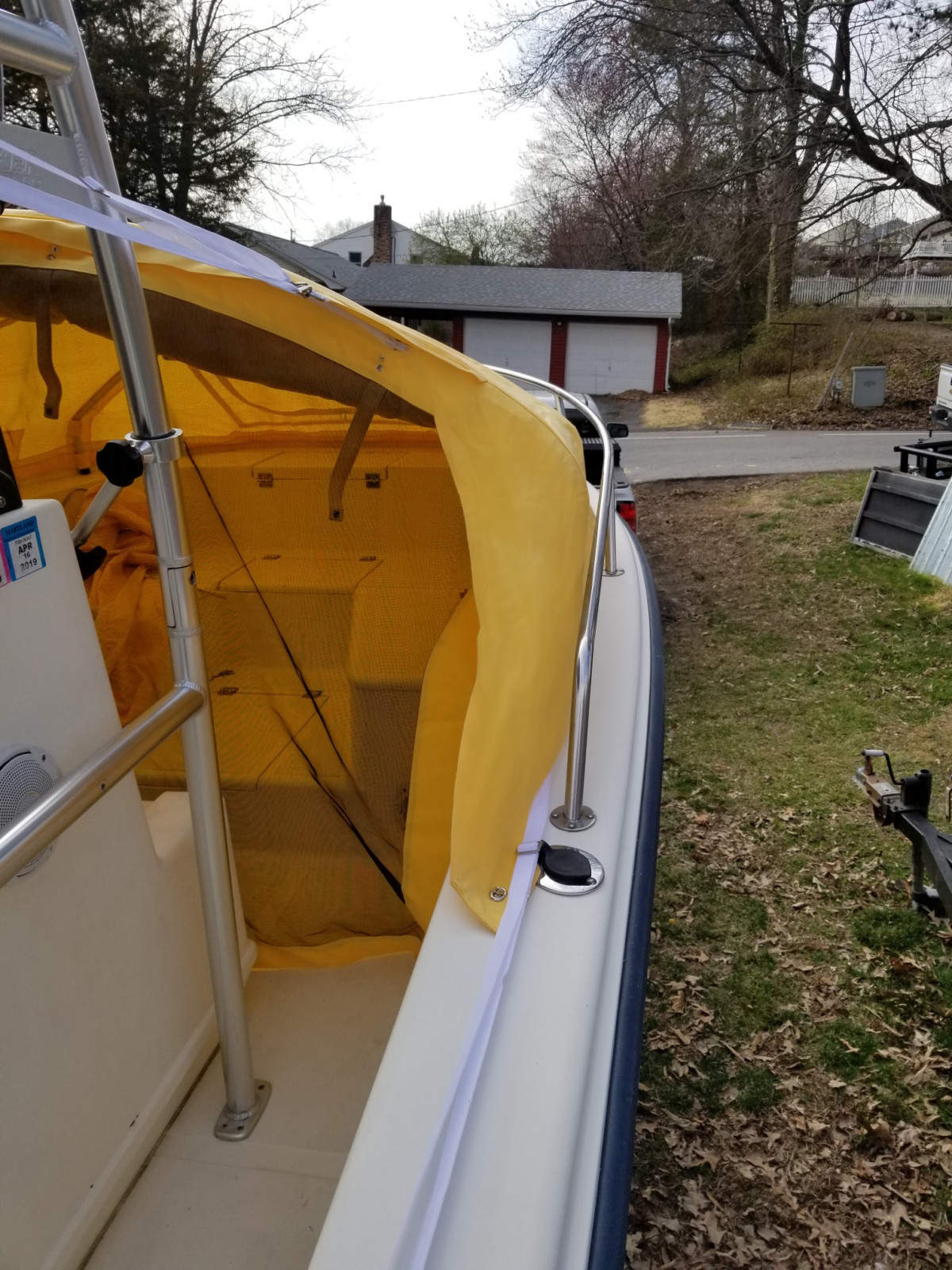 KenCraft 23 CC center console fishing boat with boat shade bow dodger