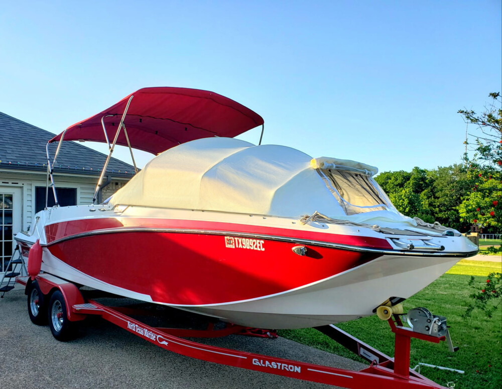 2018 Glastron GTD225 deck boat with Bow dodger cabin by Marine Canopy